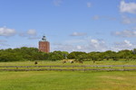 Landschaft mit Leuchtturm